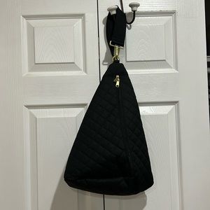 Canvella sling bag.  Black. Never worn.